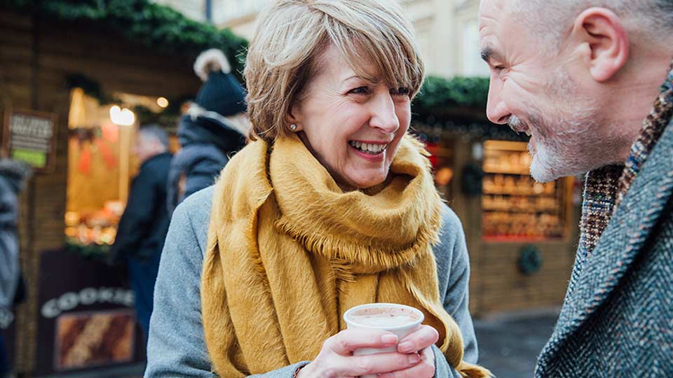 Couple smiling  -5 Tips on how to start the conversation about hearing loss