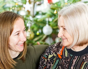 Image show two woman in conversation