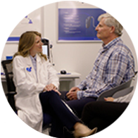 Audiologist reviewing hearing test results with a patient