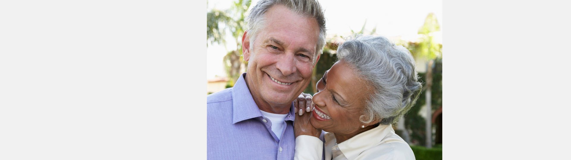 an older couple canoodling