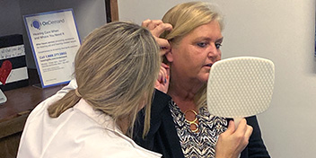 Angela Taylor gets fitted with new hearing aids 