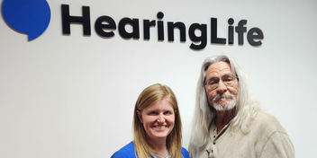 Mikel receives his free hearing aids through the HearingLife magic of giving back program