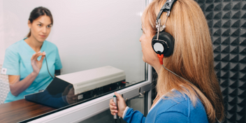 woman taking a hearing test