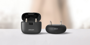 oticon real hearing aids in their chargers