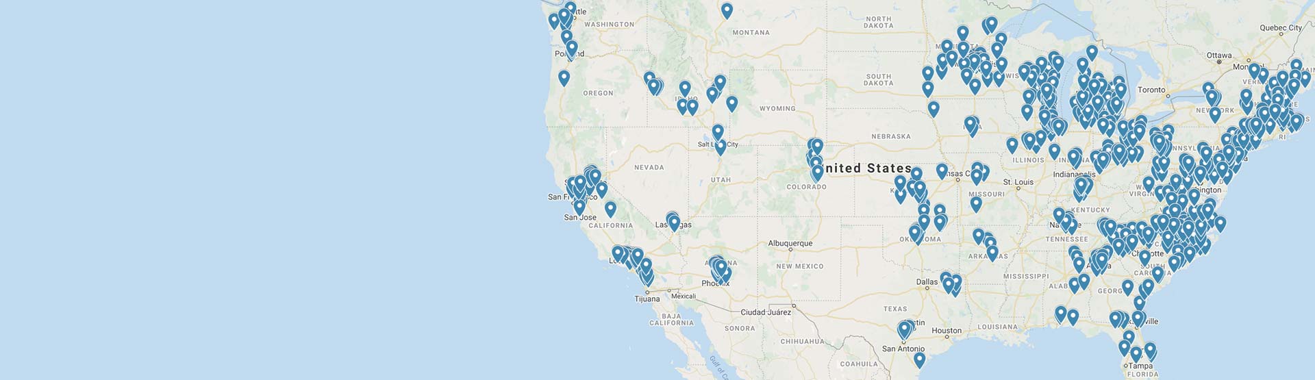 Digital map displays the United States, with blue location markers densely scattered through eastern, midwestern, and southwestern regions, representing various sites or points of interest across the country.