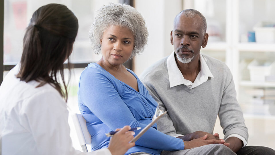 Image show couple talking with a clinician