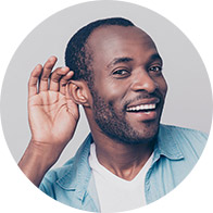 Image show smiling man holding hand behind the ear to listening