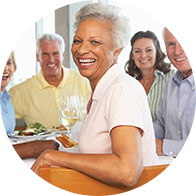 Image show happy people sitting around a table