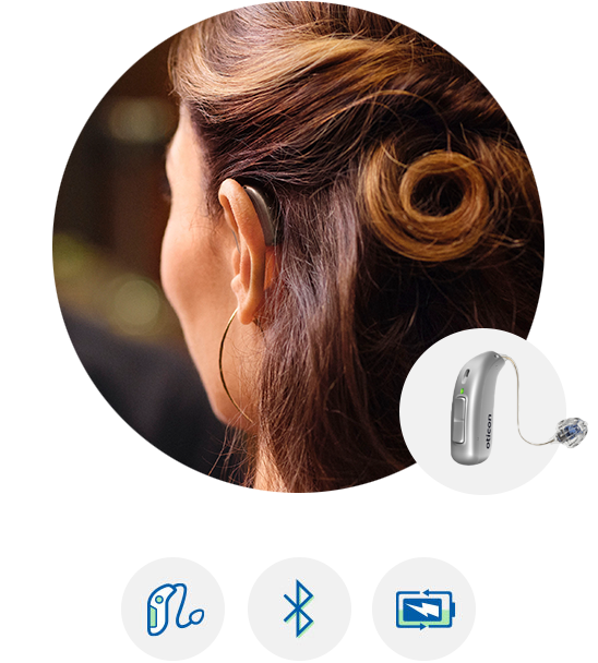 Woman wearing the NEW Oticon Real™ hearing aid