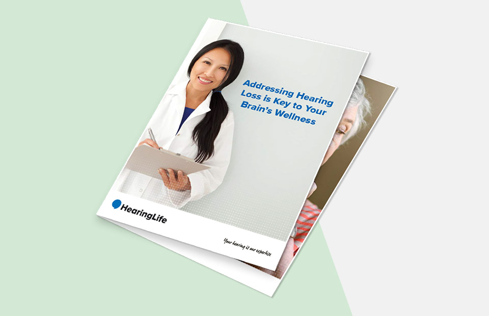 A booklet cover depicts a smiling woman in a white coat holding a clipboard. Title reads, 