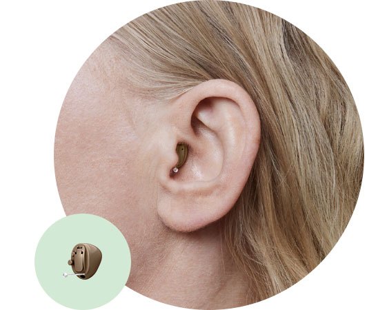 Image shows completely-in-the-canal hearing aid in ear