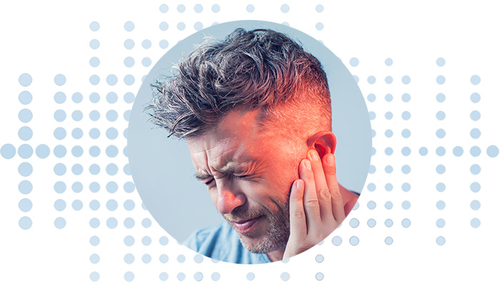 Image d'un homme avec symptômes de bourdonnement dans l'oreille